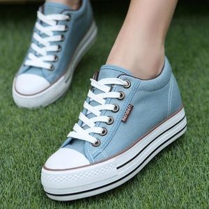 Light blue platform low top converse
